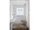 Updated bathroom featuring shower with glass door and white tile at 536 Detroit St, Denver, CO 80206