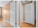 Bedroom featuring hardwood floors, closet and white doors at 536 Detroit St, Denver, CO 80206