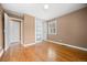 Bedroom boasts hardwood floors, neutral walls, and sliding closet doors at 536 Detroit St, Denver, CO 80206
