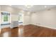 Bright bedroom features beautiful hardwood floors and sun-lit window seats at 165 N High St, Denver, CO 80218