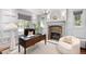 Inviting home office featuring a fireplace, and large windows at 165 N High St, Denver, CO 80218