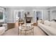 Elegant living room with a cozy fireplace, designer furnishings, and an open layout for entertaining at 165 N High St, Denver, CO 80218