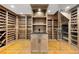 A custom wine cellar with storage racks and climate control at 165 N High St, Denver, CO 80218