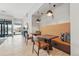 Cozy dining area with modern lighting, comfortable seating, and a stylish decor for intimate meals at 20 Wilcox St # 208, Castle Rock, CO 80104