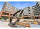 Modern condominium exterior featuring mixed materials, an 'Encore' sign, and attractive common areas at 20 Wilcox St # 208, Castle Rock, CO 80104