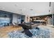 Spacious game room featuring a pool table, dining area, lounge space, and kitchen area at 20 Wilcox St # 208, Castle Rock, CO 80104