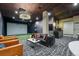 Golf simulator with comfortable seating, modern design, and an entertainment setup at 20 Wilcox St # 208, Castle Rock, CO 80104