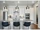 Bright, modern kitchen featuring a center island, stainless steel appliances, and subway tile backsplash at 20 Wilcox St # 208, Castle Rock, CO 80104