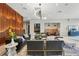 Spacious lounge area with stylish seating, unique lighting, and modern decor creating a welcoming atmosphere at 20 Wilcox St # 208, Castle Rock, CO 80104