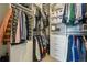 Organized walk-in closet features custom shelving and ample storage space for clothes and accessories at 20 Wilcox St # 208, Castle Rock, CO 80104