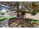 Spacious front yard with mature tree providing ample shade at 8422 Everett Way # D, Arvada, CO 80005