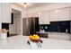 Bright kitchen with modern appliances, sleek countertops, and stylish fixtures, perfect for culinary enthusiasts at 8422 Everett Way # D, Arvada, CO 80005