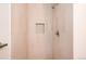 Modern tiled shower with a built-in niche at 8422 Everett Way # D, Arvada, CO 80005