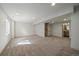 Spacious finished basement with neutral carpet, white walls, and recessed lighting at 5586 S Harlan St, Littleton, CO 80123