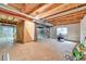 Unfinished basement with exposed wood and mechanicals provides a blank canvas at 9008 W 101St Ave, Broomfield, CO 80021