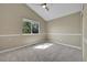 Bedroom featuring carpet, neutral walls, a window, and a ceiling fan at 9008 W 101St Ave, Broomfield, CO 80021