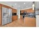 Beautiful kitchen featuring stainless steel appliances, granite countertops, and ample cabinet space at 9008 W 101St Ave, Broomfield, CO 80021