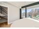 Bright bedroom with large windows, hardwood floors, and modern design at 2833 W 25Th Ave # 5, Denver, CO 80211