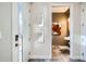 Inviting entryway with stylish tile flooring, clean lines, and access to a convenient half bathroom at 2833 W 25Th Ave # 5, Denver, CO 80211