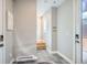 Bright entryway featuring modern tile flooring, clean lines, and convenient access to upper levels at 2833 W 25Th Ave # 5, Denver, CO 80211