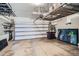Spacious garage featuring overhead storage racks, ample space, and a clean, modern design at 2833 W 25Th Ave # 5, Denver, CO 80211