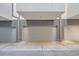 Row of modern garages offering ample parking and storage space for residents at 2833 W 25Th Ave # 5, Denver, CO 80211