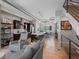 Bright, open living space with hardwood floors, modern decor, and a large island kitchen with bar seating at 2833 W 25Th Ave # 5, Denver, CO 80211