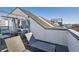 Relaxing roof deck with comfortable lounge chairs, creating an inviting outdoor space at 2833 W 25Th Ave # 5, Denver, CO 80211