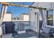 Charming roof deck featuring string lights, a grill, and comfortable seating for outdoor enjoyment at 2833 W 25Th Ave # 5, Denver, CO 80211