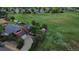 Charming red house with solar panels and a lovely yard, backing onto a large green field in a quiet neighborhood at 4664 S Union St, Morrison, CO 80465