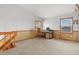 Well-lit home office space featuring carpet floors, a desk, and windows for natural light at 4664 S Union St, Morrison, CO 80465
