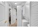 Efficient laundry room design with a stacked washer and dryer, maximizing space and convenience at 4259 S Richfield St, Aurora, CO 80013