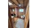 Partially renovated bathroom with installed toilet and new floors; needs finishing at 325 Aspen Rd, Idaho Springs, CO 80452