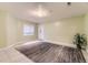 Finished basement featuring neutral paint, tile flooring and bright lighting at 9742 E Hawaii Pl, Aurora, CO 80247