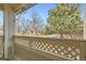 Front porch featuring a view of the street and a neatly landscaped yard and a glimpse of the home's exterior at 9742 E Hawaii Pl, Aurora, CO 80247