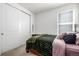 Comfortable bedroom with closet and neutral carpet at 15979 Xanthia Way, Thornton, CO 80602
