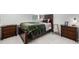 Well-lit bedroom with neutral decor and coordinated furnishings at 15979 Xanthia Way, Thornton, CO 80602