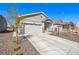 Charming one-story home featuring neutral siding, a front porch, a well-maintained lawn, and an attached garage at 15979 Xanthia Way, Thornton, CO 80602