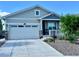 Charming single-Gathering home featuring a well-manicured front yard, covered porch, and a two-car garage at 15979 Xanthia Way, Thornton, CO 80602
