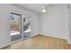 Bright bedroom with sliding door to access backyard at 3369 S Monaco Street Pkwy # A, Denver, CO 80222