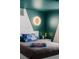 Bedroom featuring creative celestial design with a lit moon, lending a playful and imaginative ambiance at 9380 W 51St Ave, Arvada, CO 80002