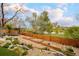 Beautiful garden area with planter boxes, landscaping and access to the lake at 9380 W 51St Ave, Arvada, CO 80002