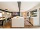 Spacious kitchen with a large island, modern appliances, and adjacent dining area at 9380 W 51St Ave, Arvada, CO 80002