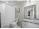 This full bathroom features great lighting, neutral colors, and a shower and bathtub at 13734 Ash Cir, Brighton, CO 80602