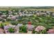 Aerial view of house and surrounding neighborhood at 5965 Topaz Vista Pl, Castle Pines, CO 80108