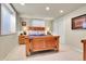 Basement bedroom with double doors and window at 5965 Topaz Vista Pl, Castle Pines, CO 80108