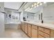 Bathroom boasts double sinks, a soaking tub and separate shower at 5965 Topaz Vista Pl, Castle Pines, CO 80108