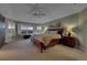 Spacious main bedroom with ample natural light and room for furniture at 5965 Topaz Vista Pl, Castle Pines, CO 80108