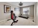 Home gym with treadmill and weight bench at 5965 Topaz Vista Pl, Castle Pines, CO 80108