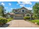 Charming two-story home with a well-maintained lawn and a spacious driveway at 15904 W 58Th Ave, Golden, CO 80403